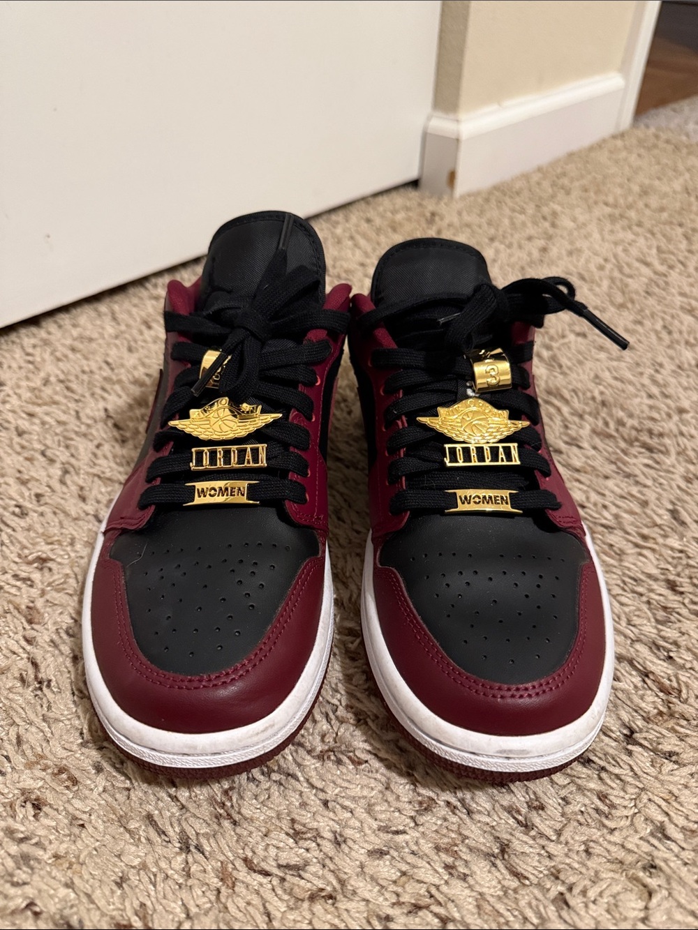 Jordan Women's Low-Top Sneakers in Black and Burgundy with Gold Accents